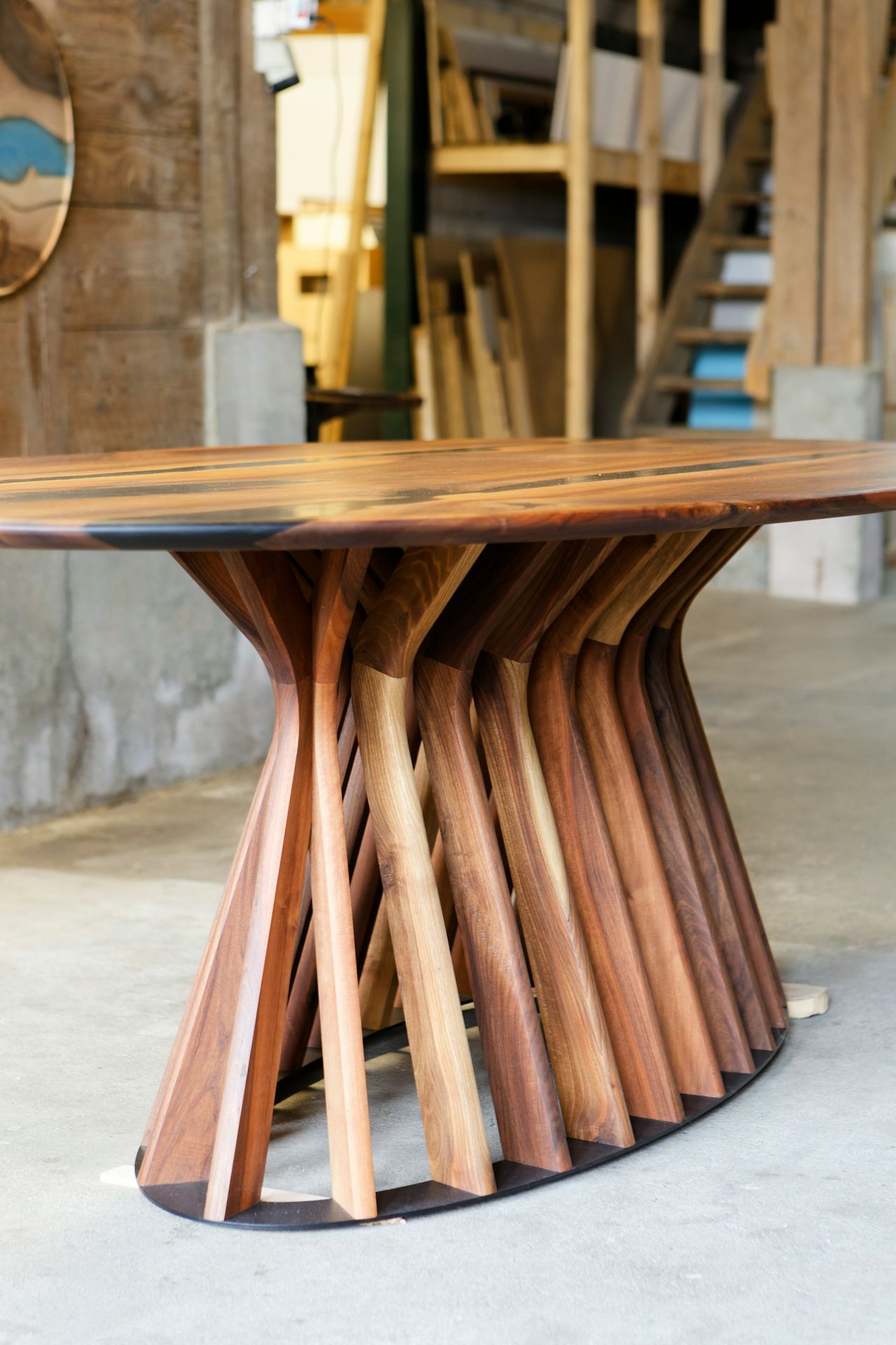 A table made out of wooden sticks and a clock